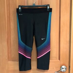 Nike Capri Dri-fit running tights. Only wore once!